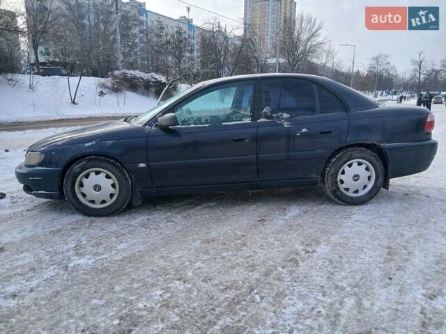 Синий Опель Омега, объемом двигателя 2.2 л и пробегом 333 тыс. км за 2300 $, фото 2 на Automoto.ua