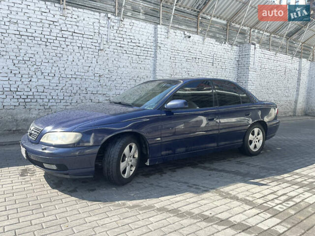 Синий Опель Омега, объемом двигателя 2.6 л и пробегом 351 тыс. км за 2700 $, фото 1 на Automoto.ua
