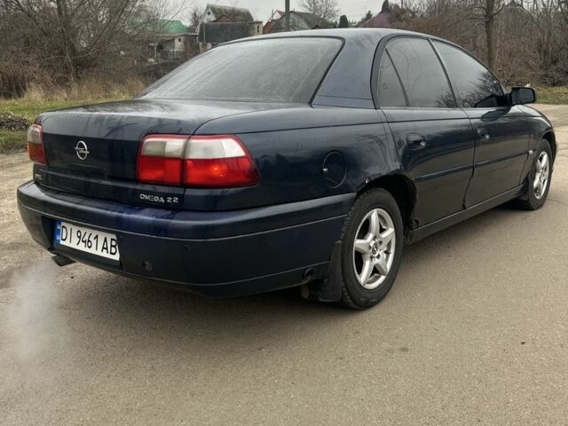 Синий Опель Омега, объемом двигателя 2.2 л и пробегом 343 тыс. км за 2000 $, фото 3 на Automoto.ua
