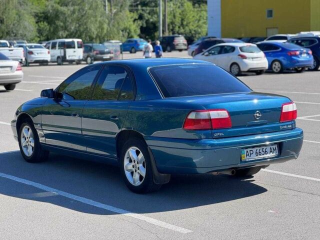Синий Опель Омега, объемом двигателя 2.2 л и пробегом 113 тыс. км за 3500 $, фото 6 на Automoto.ua