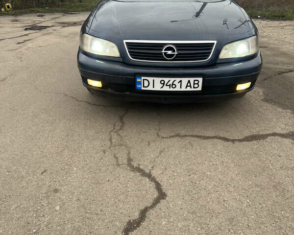 Синій Опель Омега, об'ємом двигуна 2.2 л та пробігом 343 тис. км за 2000 $, фото 2 на Automoto.ua
