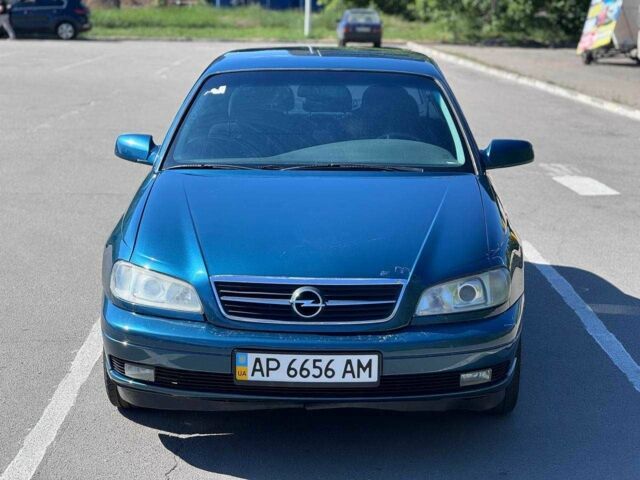Синий Опель Омега, объемом двигателя 2.2 л и пробегом 113 тыс. км за 3500 $, фото 2 на Automoto.ua