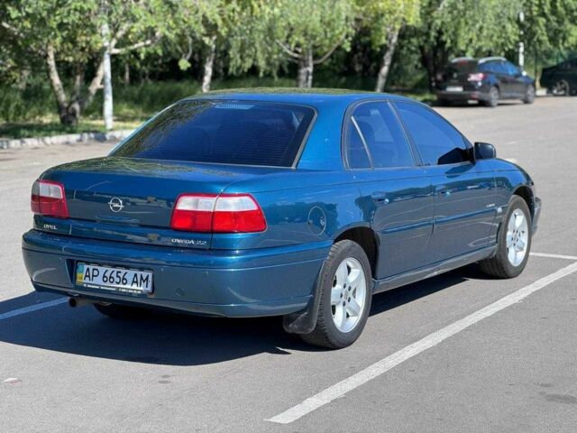 Синий Опель Омега, объемом двигателя 2.2 л и пробегом 113 тыс. км за 3500 $, фото 8 на Automoto.ua