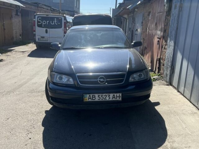 Синий Опель Омега, объемом двигателя 2.2 л и пробегом 400 тыс. км за 1700 $, фото 2 на Automoto.ua