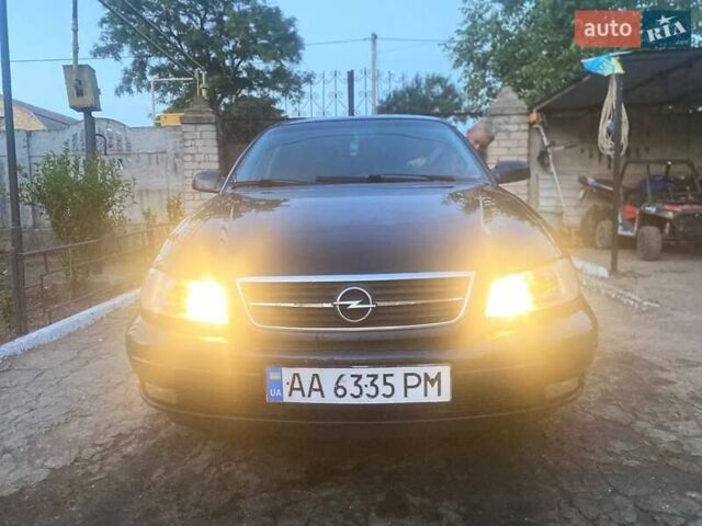 Синий Опель Омега, объемом двигателя 2.22 л и пробегом 300 тыс. км за 2800 $, фото 5 на Automoto.ua