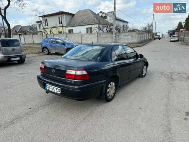 Синий Опель Омега, объемом двигателя 2.2 л и пробегом 390 тыс. км за 1299 $, фото 5 на Automoto.ua