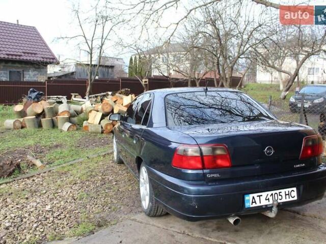 Синий Опель Омега, объемом двигателя 2.5 л и пробегом 338 тыс. км за 4700 $, фото 9 на Automoto.ua