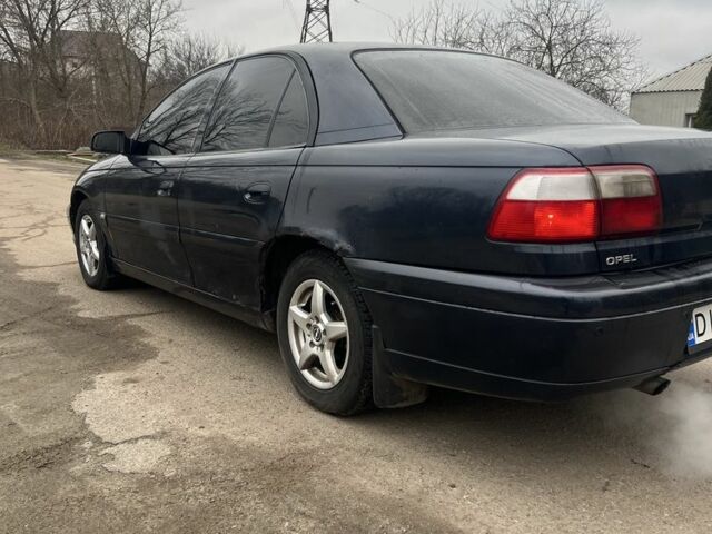 Синий Опель Омега, объемом двигателя 2.2 л и пробегом 343 тыс. км за 2000 $, фото 5 на Automoto.ua