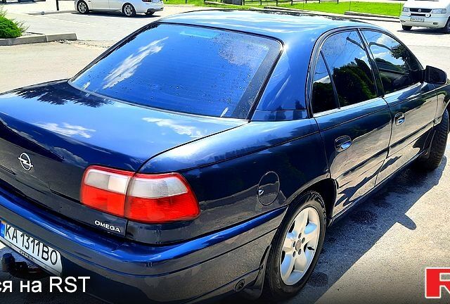 Синий Опель Омега, объемом двигателя 2.2 л и пробегом 333 тыс. км за 3499 $, фото 3 на Automoto.ua