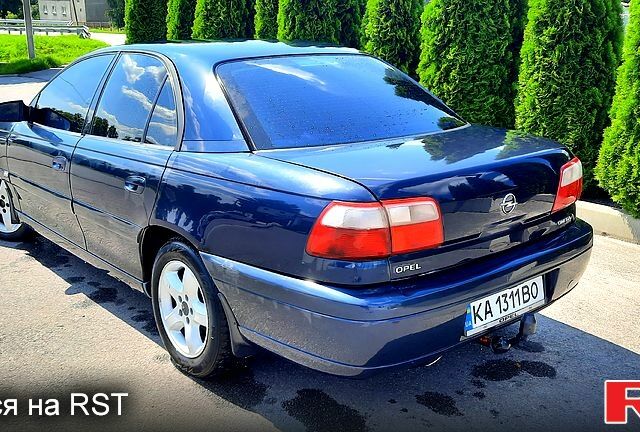 Синий Опель Омега, объемом двигателя 2.2 л и пробегом 333 тыс. км за 3499 $, фото 2 на Automoto.ua