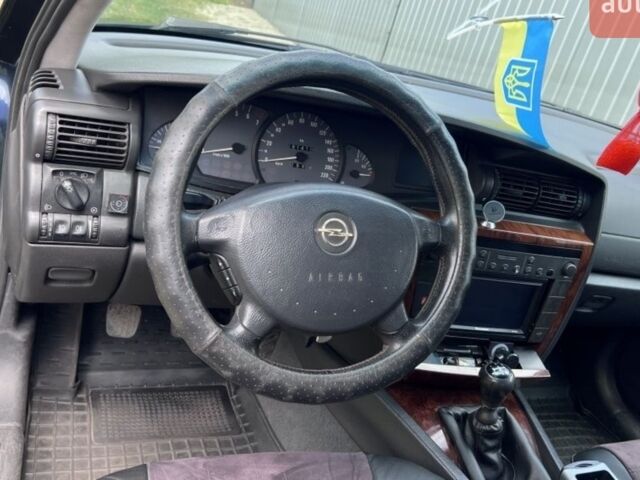 Синій Опель Омега, об'ємом двигуна 2.2 л та пробігом 260 тис. км за 2800 $, фото 3 на Automoto.ua