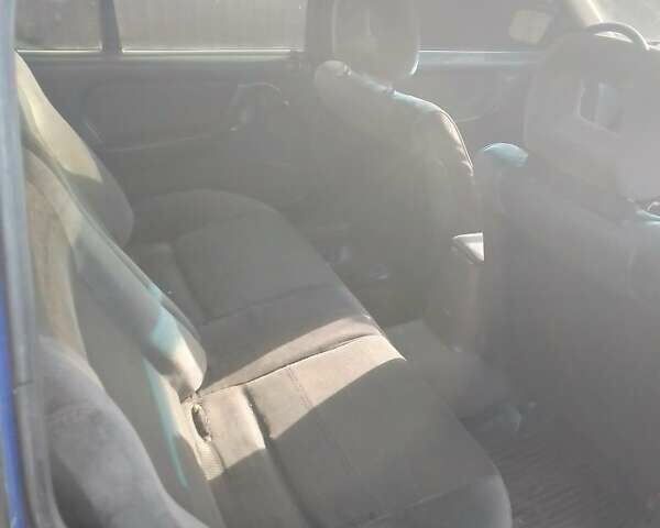 Синий Опель Омега, объемом двигателя 2 л и пробегом 400 тыс. км за 1150 $, фото 2 на Automoto.ua