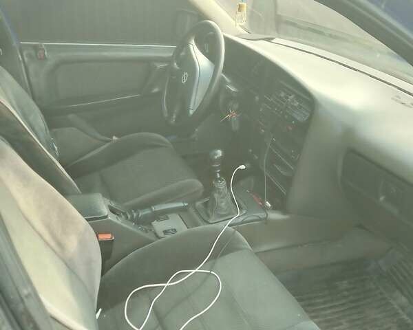 Синий Опель Омега, объемом двигателя 2 л и пробегом 400 тыс. км за 1150 $, фото 3 на Automoto.ua