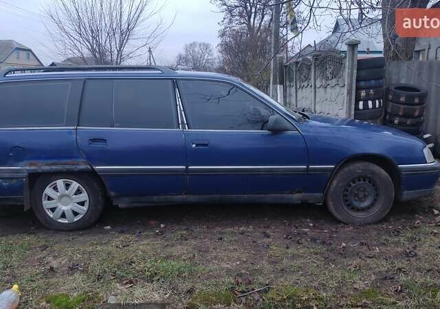 Синій Опель Омега, об'ємом двигуна 2 л та пробігом 248 тис. км за 1000 $, фото 1 на Automoto.ua