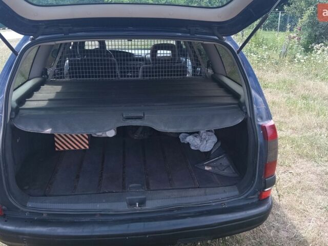 Синій Опель Омега, об'ємом двигуна 2 л та пробігом 317 тис. км за 1550 $, фото 14 на Automoto.ua