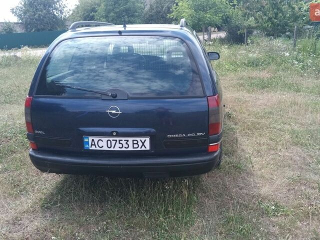 Синій Опель Омега, об'ємом двигуна 2 л та пробігом 317 тис. км за 1550 $, фото 6 на Automoto.ua