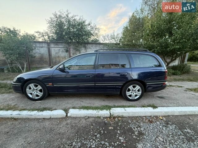 Синий Опель Омега, объемом двигателя 2 л и пробегом 307 тыс. км за 1500 $, фото 1 на Automoto.ua
