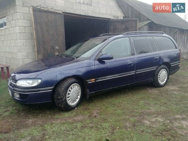 Синий Опель Омега, объемом двигателя 2 л и пробегом 300 тыс. км за 1250 $, фото 1 на Automoto.ua