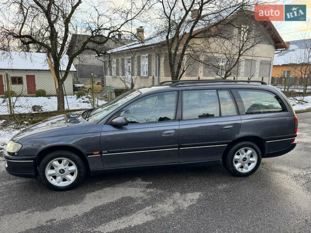 Синий Опель Омега, объемом двигателя 2 л и пробегом 335 тыс. км за 1599 $, фото 17 на Automoto.ua