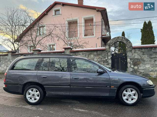 Синий Опель Омега, объемом двигателя 2 л и пробегом 335 тыс. км за 1599 $, фото 5 на Automoto.ua