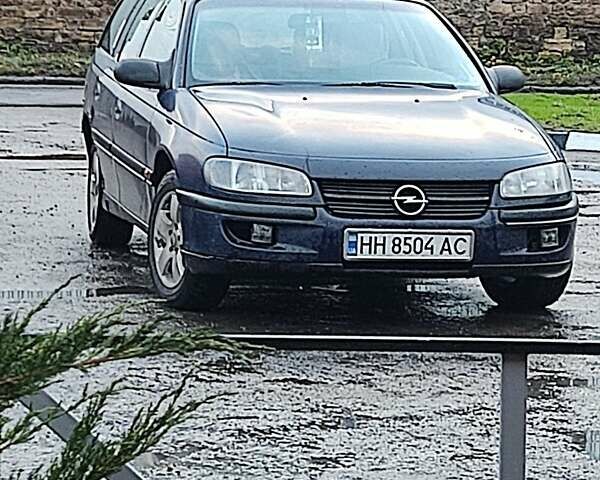 Синий Опель Омега, объемом двигателя 2 л и пробегом 383 тыс. км за 1800 $, фото 2 на Automoto.ua