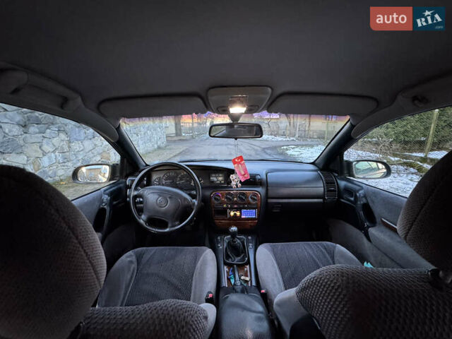 Синий Опель Омега, объемом двигателя 2 л и пробегом 335 тыс. км за 1599 $, фото 33 на Automoto.ua