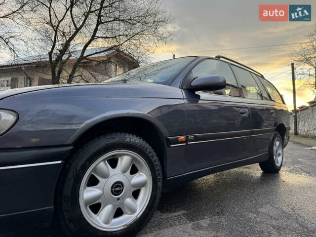 Синий Опель Омега, объемом двигателя 2 л и пробегом 335 тыс. км за 1599 $, фото 18 на Automoto.ua