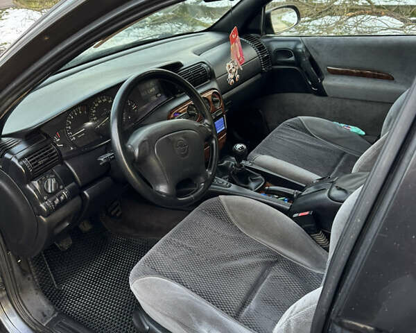 Синий Опель Омега, объемом двигателя 2 л и пробегом 335 тыс. км за 1599 $, фото 22 на Automoto.ua