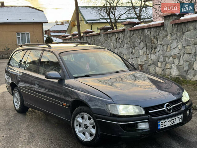 Синий Опель Омега, объемом двигателя 2 л и пробегом 335 тыс. км за 1599 $, фото 3 на Automoto.ua