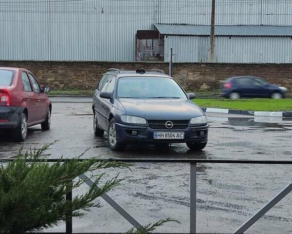 Синий Опель Омега, объемом двигателя 2 л и пробегом 383 тыс. км за 1800 $, фото 3 на Automoto.ua