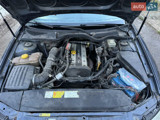 Синий Опель Омега, объемом двигателя 2 л и пробегом 335 тыс. км за 1599 $, фото 36 на Automoto.ua