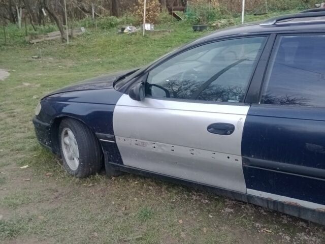Синий Опель Омега, объемом двигателя 2 л и пробегом 430 тыс. км за 1500 $, фото 6 на Automoto.ua