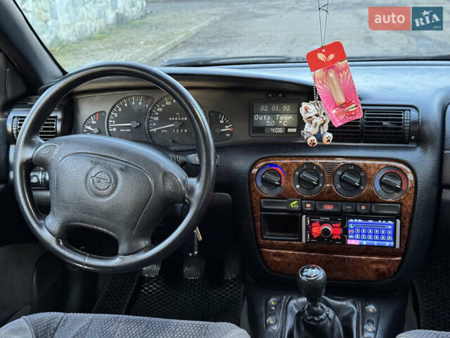 Синий Опель Омега, объемом двигателя 2 л и пробегом 335 тыс. км за 1599 $, фото 35 на Automoto.ua