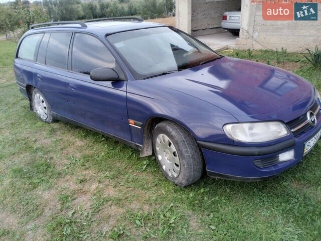 Синій Опель Омега, об'ємом двигуна 2 л та пробігом 306 тис. км за 1500 $, фото 4 на Automoto.ua