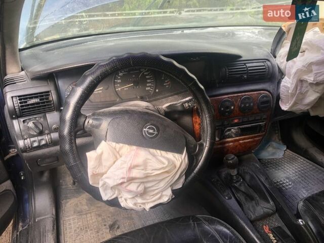 Синий Опель Омега, объемом двигателя 2.5 л и пробегом 222 тыс. км за 600 $, фото 4 на Automoto.ua
