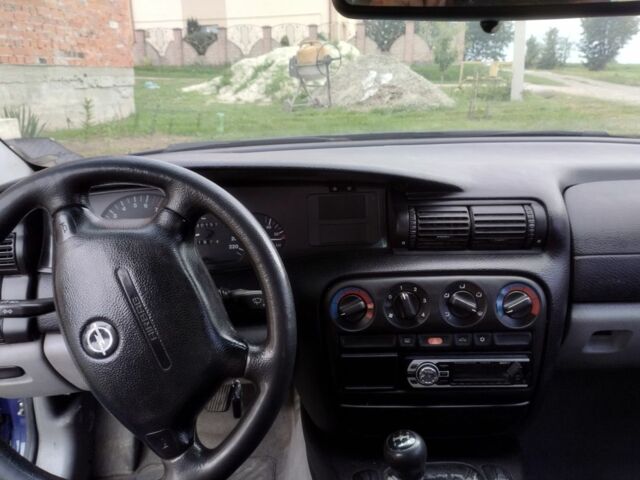 Синій Опель Омега, об'ємом двигуна 2 л та пробігом 306 тис. км за 1950 $, фото 4 на Automoto.ua