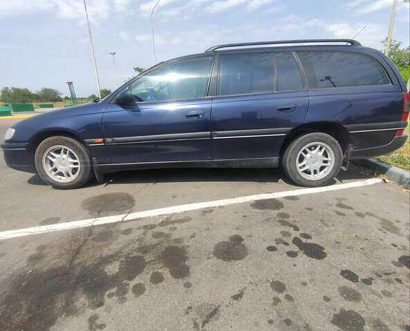 Опель Омега 1996 в Николаеве на Automoto.ua Синий Опель Омега, объемом двигателя 2.5 л и пробегом 335 тыс. км за 3500 $, фото 7 на Automoto.ua
