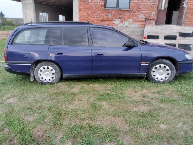 Синій Опель Омега, об'ємом двигуна 2 л та пробігом 306 тис. км за 1950 $, фото 6 на Automoto.ua