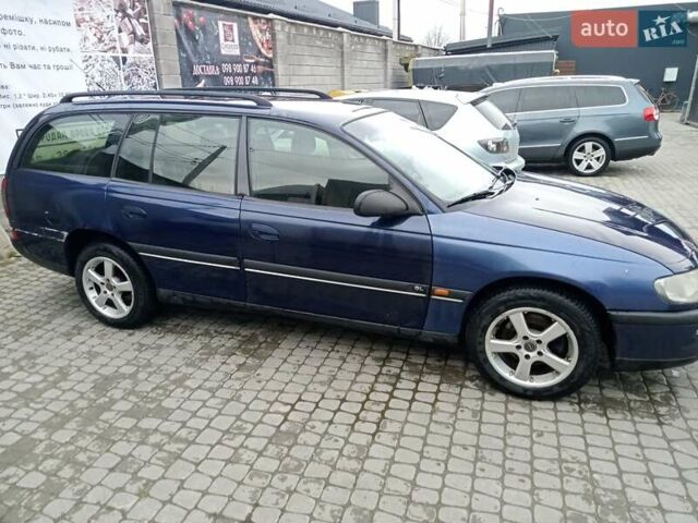 Синий Опель Омега, объемом двигателя 2 л и пробегом 450 тыс. км за 1300 $, фото 3 на Automoto.ua