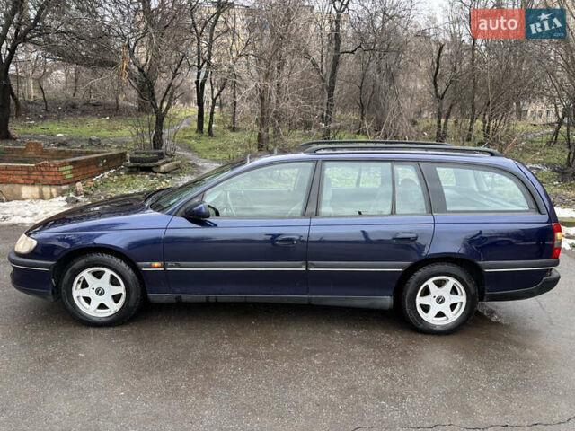 Синий Опель Омега, объемом двигателя 2 л и пробегом 300 тыс. км за 2850 $, фото 5 на Automoto.ua