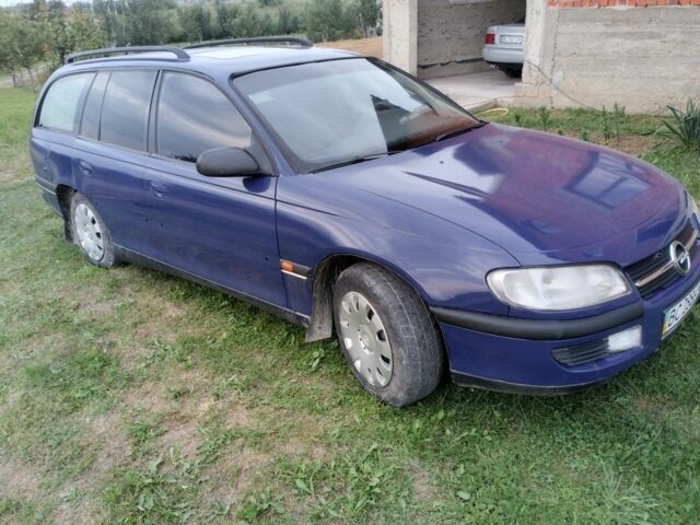 Синій Опель Омега, об'ємом двигуна 2 л та пробігом 306 тис. км за 1950 $, фото 5 на Automoto.ua