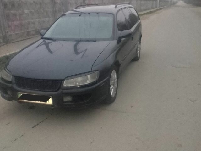 Синий Опель Омега, объемом двигателя 2.5 л и пробегом 200 тыс. км за 900 $, фото 3 на Automoto.ua