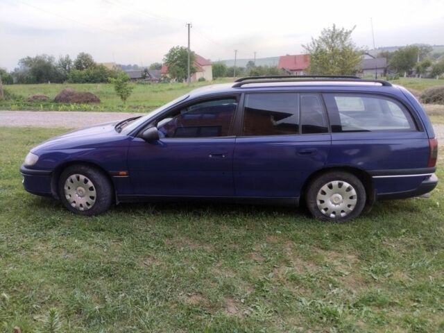 Синій Опель Омега, об'ємом двигуна 2 л та пробігом 306 тис. км за 1950 $, фото 9 на Automoto.ua