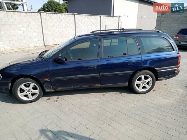 Синий Опель Омега, объемом двигателя 2 л и пробегом 450 тыс. км за 1300 $, фото 1 на Automoto.ua