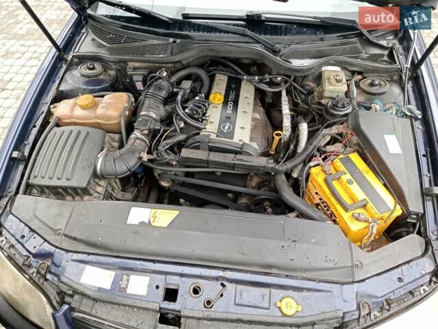 Синий Опель Омега, объемом двигателя 2 л и пробегом 450 тыс. км за 1300 $, фото 2 на Automoto.ua