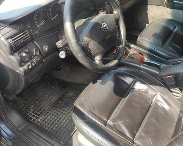 Опель Омега 1996 в Николаеве на Automoto.ua Синий Опель Омега, объемом двигателя 2.5 л и пробегом 335 тыс. км за 3500 $, фото 2 на Automoto.ua