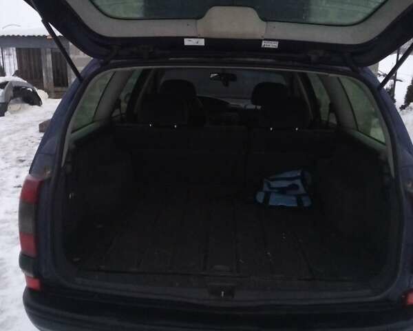 Синий Опель Омега, объемом двигателя 2 л и пробегом 400 тыс. км за 1500 $, фото 5 на Automoto.ua