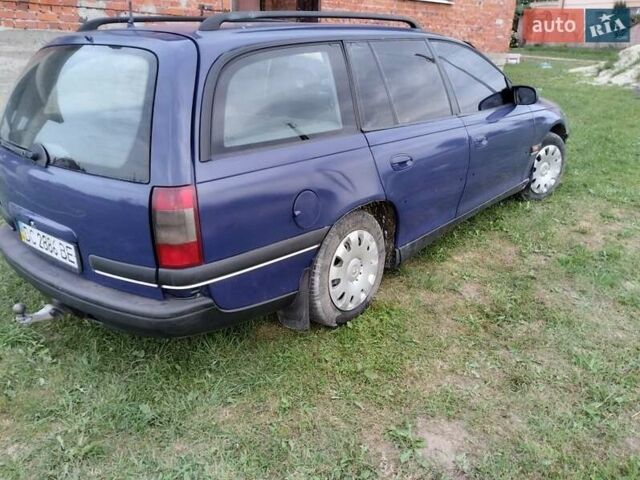 Синій Опель Омега, об'ємом двигуна 2 л та пробігом 306 тис. км за 1950 $, фото 1 на Automoto.ua