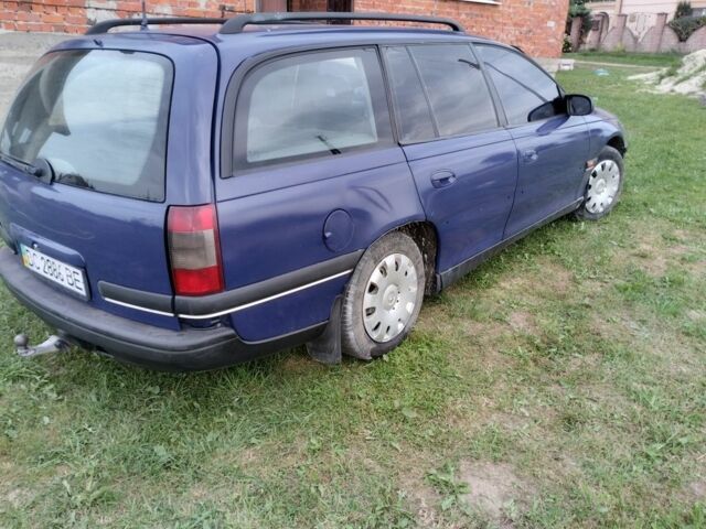 Синій Опель Омега, об'ємом двигуна 2 л та пробігом 306 тис. км за 1950 $, фото 2 на Automoto.ua