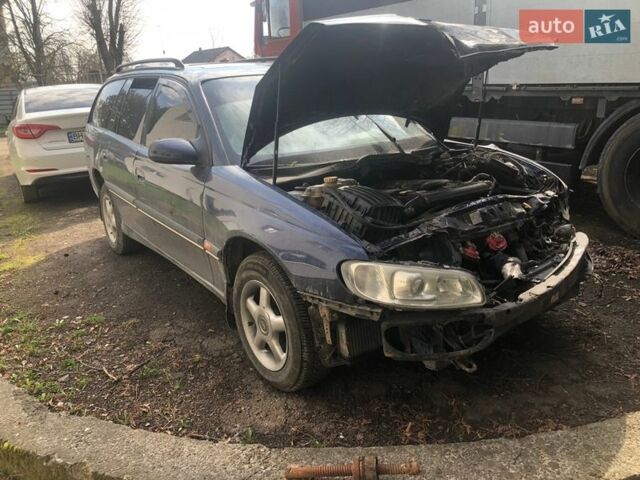 Синий Опель Омега, объемом двигателя 2.5 л и пробегом 222 тыс. км за 600 $, фото 1 на Automoto.ua